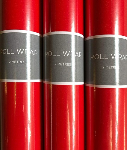 Red wrapping paper rolls - m,